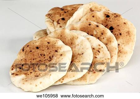 Freshly baked handmade pita bread View Large Photo Image Stock Photo - Freshly baked handmade pita bread. Fotosearch