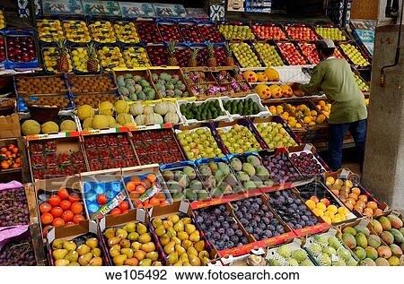 Fruitstand shopkeeper working in the Casablanca market, Morocco View Large Photo Image Stock Image - Fruitstand shopkeeper working in the Casablanca market, Morocco. Fotosearch