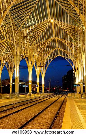 Stock Image - Gare do Oriente railway station by Santiago Calatrava at dusk, Parque das Nações, Lisbon, Portugal. Fotosearch