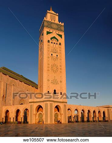 Golden Hassan II Mosque and minaret with blue sky at sunset, Morocco View Large Photo Image Stock Photo - Golden Hassan II Mosque and minaret with blue sky at sunset, Morocco. Fotosearch