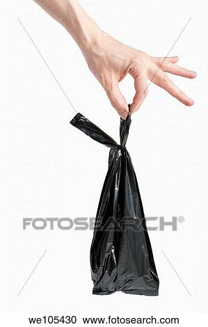 Hand holding Garbage Bag View Large Photo Image Stock Image - Hand holding Garbage Bag. Fotosearch