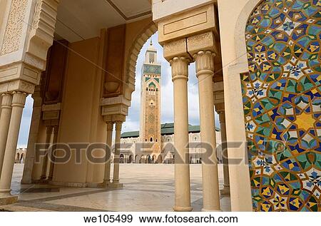 Hassan II Mosque minaret framed by a plaza arch and tilework in Casablanca Morocco View Large Photo Image Stock Photo - Hassan II Mosque minaret framed by a plaza arch and tilework in Casablanca Morocco. Fotosearch