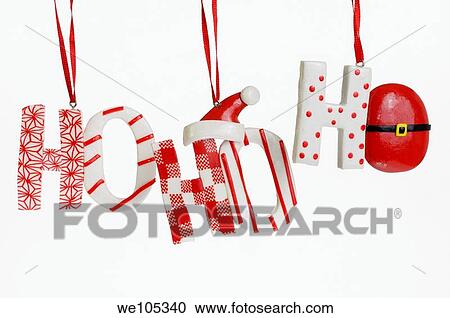 Stock Image - Ho Ho Ho candy Christmas tree ornaments on a white background. Fotosearch