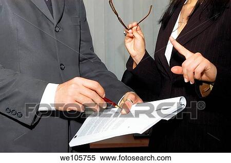 Stock Photography - Informal meeting discussion between a businessman and a businesswoman. Fotosearch
