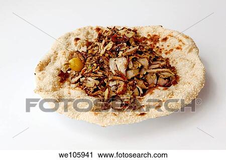 Lamb and turkey shawarma in a Lafa flat Iraqi pita View Large Photo Image Stock Image - Lamb and turkey shawarma in a Lafa flat Iraqi pita. Fotosearch