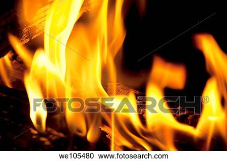 Logs burning in an outdoor campfire View Large Photo Image Stock Image - Logs burning in an outdoor campfire. Fotosearch