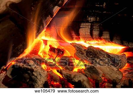 Logs burning in an outdoor campfire View Large Photo Image Stock Photo - Logs burning in an outdoor campfire. Fotosearch