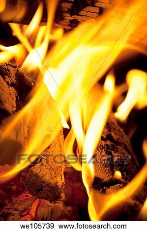 Logs burning in an outdoor campfire View Large Photo Image Stock Photo - Logs burning in an outdoor campfire. Fotosearch