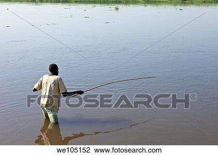 man fishing in Nile River, Bor Sudan, december 2010 View Large Photo Image Stock Image - man fishing in Nile River, Bor Sudan, december 2010. Fotosearch