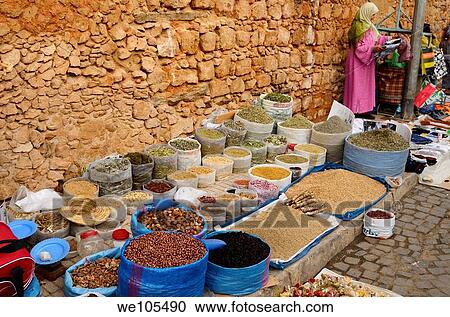 Moroccan vendors selling herbs and goods along the wall of the old Medina Casablanca, Morocco View Large Photo Image Stock Image - Moroccan vendors selling herbs and goods along the wall of the old Medina Casablanca, Morocco. Fotosearch
