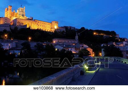 Old Bridge and Saint-Nazaire cathedral at dusk, Beziers, Herault, Languedoc-Roussillon, France View Large Photo Image Stock Photo - Old Bridge and Saint-Nazaire cathedral at dusk, Beziers, Herault, Languedoc-Roussillon, France. Fotosearch