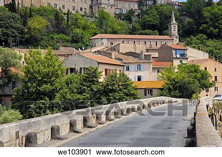 Stock Image - Old Bridge over River Orb, Beziers, Herault, Languedoc-Roussillon, France. Fotosearch