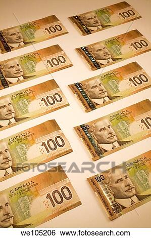 One Thousand dollars in Canadian One- Hundred Dollar Currency Bank Notes on a White Background, Studio Composition View Large Photo Image Stock Photograph - One Thousand dollars in Canadian One- Hundred Dollar Currency Bank Notes on a White Background, Studio Composition. Fotosearch