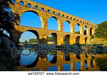 Pont du Gard Roman aqueduct, Gard, Languedoc-Roussillon, France View Large Photo Image Stock Photo - Pont du Gard Roman aqueduct, Gard, Languedoc-Roussillon, France. Fotosearch