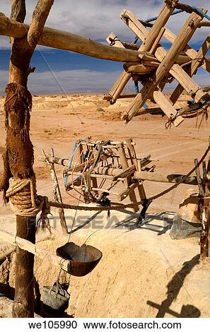 Pulleys ropes and buckets at Khettara well in the arid Tafilalt basin of Morocco View Large Photo Image Stock Image - Pulleys ropes and buckets at Khettara well in the arid Tafilalt basin of Morocco. Fotosearch
