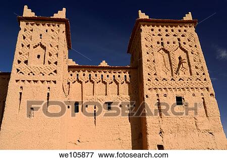 Rooftop towers of Kasbah Amerhidil against a blue sky in the Skoura oasis Morocco View Large Photo Image Stock Photo - Rooftop towers of Kasbah Amerhidil against a blue sky in the Skoura oasis Morocco. Fotosearch