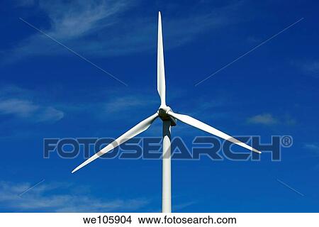 Rotor of a wind turbine for generating renewable energy against blue sky View Large Photo Image Picture - Rotor of a wind turbine for generating renewable energy against blue sky. Fotosearch