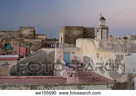 Soft pastel pink and blue at dawn over rooftops of Essaouira Morocco View Large Photo Image Stock Image - Soft pastel pink and blue at dawn over rooftops of Essaouira Morocco. Fotosearch