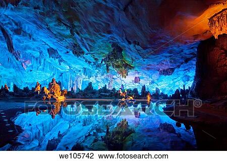 The beautifully illuminated Reed Flute Caves displaying the ´Crystal Palace of the Dragon King´ formations Located in Guilin, Guangxi Provine, China View Large Photo Image Stock Image - The beautifully illuminated Reed Flute Caves displaying the ´Crystal Palace of the Dragon King´ formations Located in Guilin, Guangxi Provine, China. Fotosearch