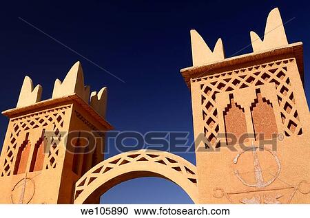 Traditional Berber pise towers made of red adobe and blue sky at resort in Dades Valley View Large Photo Image Stock Image - Traditional Berber pise towers made of red adobe and blue sky at resort in Dades Valley. Fotosearch