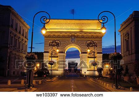 Triumphal Arch at dusk, Montpellier, Herault, Languedoc-Roussillon, France View Large Photo Image Stock Photo - Triumphal Arch at dusk, Montpellier, Herault, Languedoc-Roussillon, France. Fotosearch