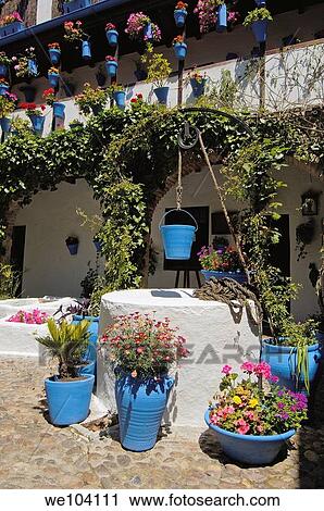 Typical courtyard in San Basilio quarter, Jewish quarter, Cordoba, Andalusia, Spain View Large Photo Image Stock Image - Typical courtyard in San Basilio quarter, Jewish quarter, Cordoba, Andalusia, Spain. Fotosearch
