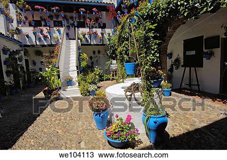 Typical courtyard in San Basilio quarter, Jewish quarter, Cordoba, Andalusia, Spain View Large Photo Image Stock Image - Typical courtyard in San Basilio quarter, Jewish quarter, Cordoba, Andalusia, Spain. Fotosearch