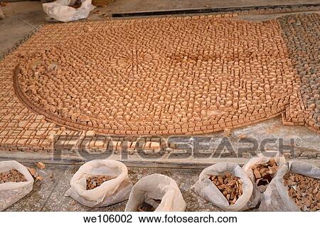 Upside down pieces of Zellige terra cotta glazed tiles to form a mosaic pattern Fes Morocco View Large Photo Image Stock Image - Upside down pieces of Zellige terra cotta glazed tiles to form a mosaic pattern Fes Morocco. Fotosearch