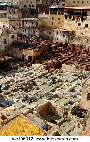White liming chrome vats and brown tanning pits in Chouara quarter Fes Tannery Morocco View Large Photo Image Stock Image - White liming chrome vats and brown tanning pits in Chouara quarter Fes Tannery Morocco. Fotosearch