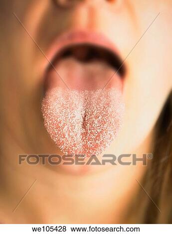 Woman with sugar on her tongue View Large Photo Image Stock Photo - Woman with sugar on her tongue. Fotosearch