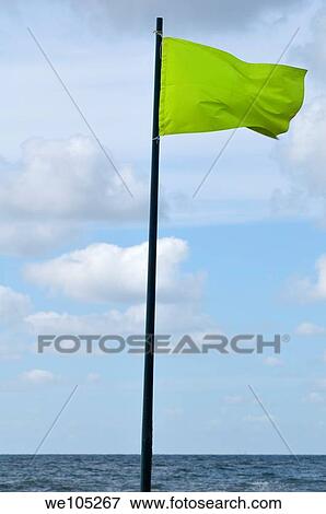 Yellow flag View Large Photo Image Stock Photo - Yellow flag. Fotosearch
