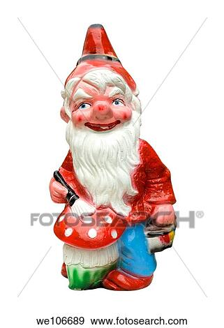 Stock Photo - A figure of garden dwarf painting toadstool mushroom. Fotosearch