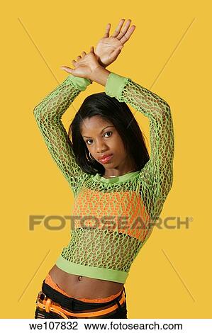 Stock Image - African American woman in early 20´s doing glamour modeling. Fotosearch