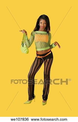 Stock Photograph - African American woman in early 20´s doing glamour modeling. Fotosearch