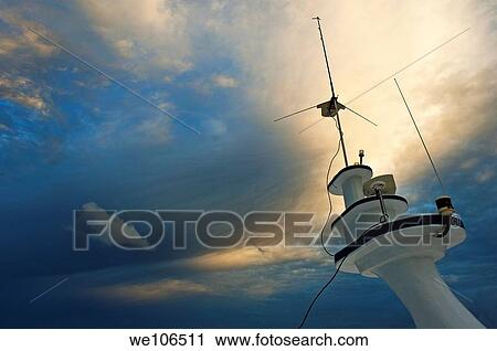 Antennas of a diver´s cruise boat at sunset, Maldives View Large Photo Image Stock Image - Antennas of a diver´s cruise boat at sunset, Maldives. Fotosearch