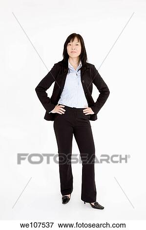 Stock Photo - Beautiful Asian Businesswoman posing on a white background. Fotosearch