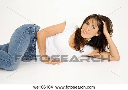 Beautiful Brazilian or Hispanic woman in casual clothes on a white background View Large Photo Image Picture - Beautiful Brazilian or Hispanic woman in casual clothes on a white background. Fotosearch