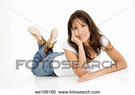 Beautiful Brazilian or Hispanic woman in casual clothes on a white background View Large Photo Image Stock Image - Beautiful Brazilian or Hispanic woman in casual clothes on a white background. Fotosearch