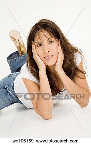Beautiful Brazilian or Hispanic woman in casual clothes on a white background View Large Photo Image Stock Photo - Beautiful Brazilian or Hispanic woman in casual clothes on a white background. Fotosearch