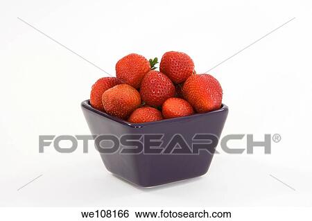 Bowl of strawberries on white background View Large Photo Image Stock Photograph - Bowl of strawberries on white background. Fotosearch