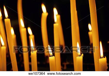 Candles burning in the Auch Cathedral, Auch, France View Large Photo Image Picture - Candles burning in the Auch Cathedral, Auch, France. Fotosearch