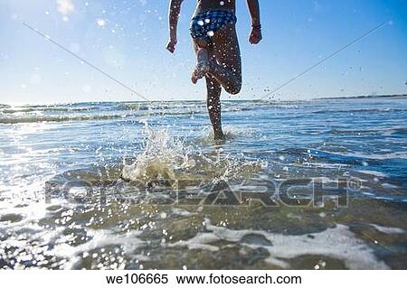 Child Running at Beach View Large Photo Image Stock Photography - Child Running at Beach. Fotosearch