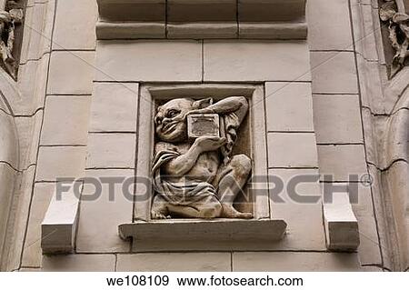 Stock Photo - Close-up of a Figurine on the exterior Wall of an Old Architectural Building on Saint-Antoine Street, Old Montreal, Quebec, Canada. Fotosearch