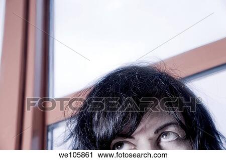 Stock Image - Close-up of a young woman. Fotosearch