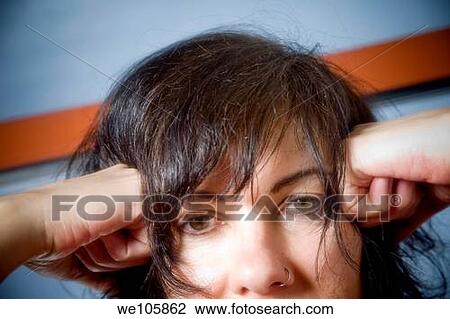 Stock Image - Close-up of a young woman. Fotosearch
