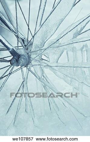 Stock Photo - Close-up of Bicycle wheel covered in ice, Sweden. Fotosearch