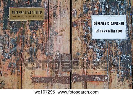 Closed wooden doors with signs on them, Bordeaux, France View Large Photo Image Stock Photography - Closed wooden doors with signs on them, Bordeaux, France. Fotosearch
