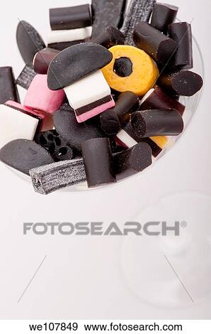 Stock Photo - Cocktail Glass filled with Liquorice Candy. Fotosearch