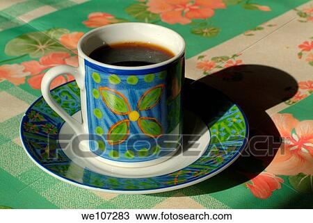 Coffee in a brightly decorated ceramic mug View Large Photo Image Stock Image - Coffee in a brightly decorated ceramic mug. Fotosearch