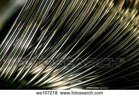 Coiled metal spring View Large Photo Image Stock Photo - Coiled metal spring. Fotosearch